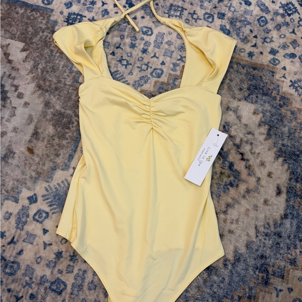 Baby yellow bodysuit